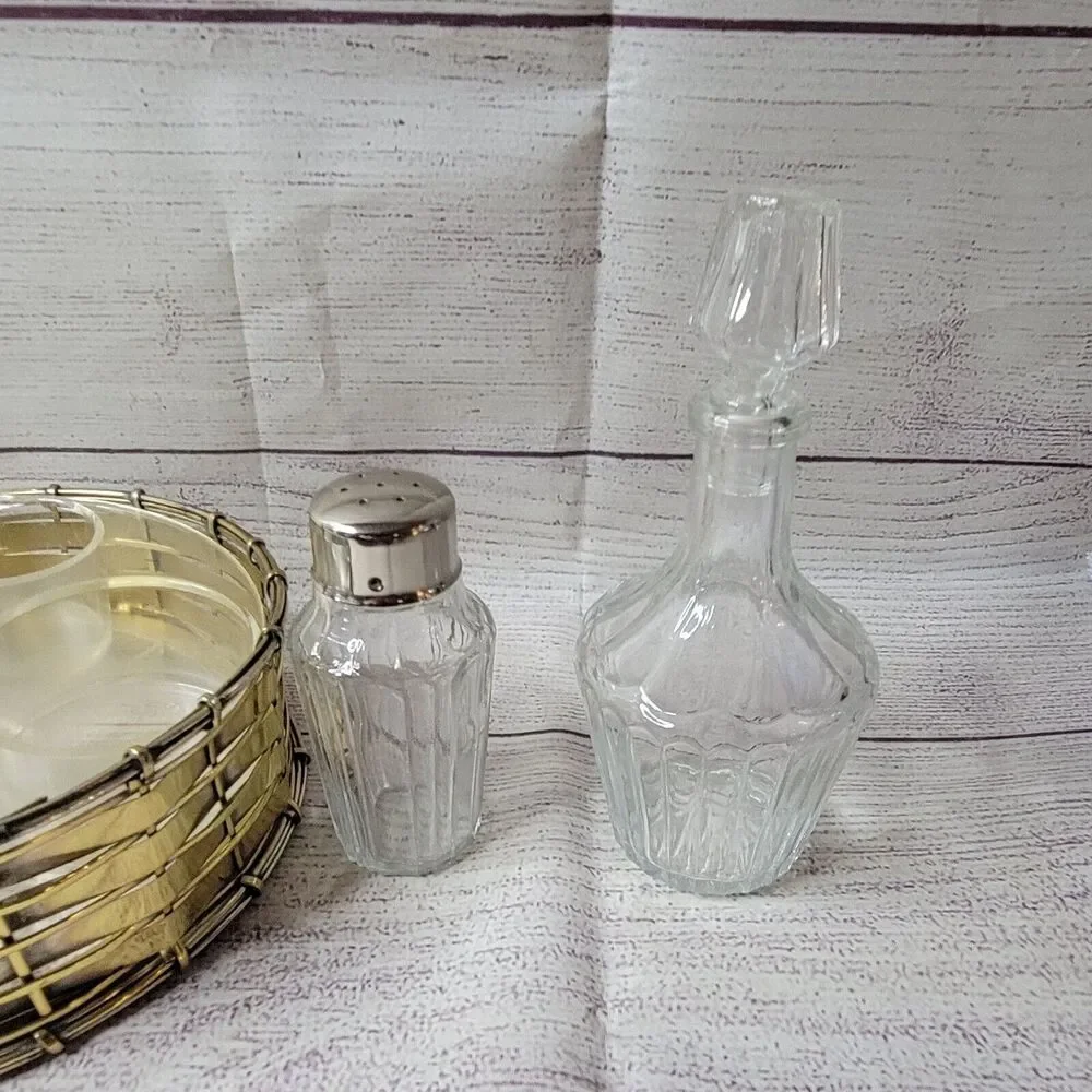 Vintage brass salt, pepper, vinegar, and oil jars with holder table-centerpiece